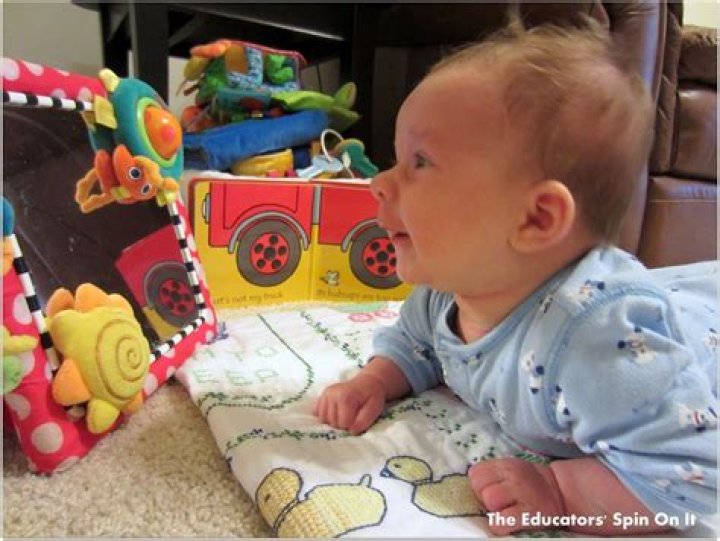 Can 2 month old play with toys