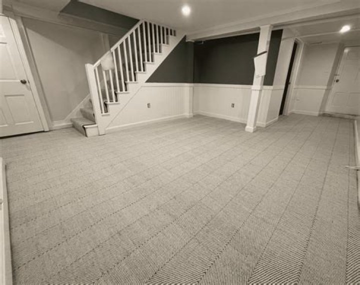 Can carpet tiles be used on walls