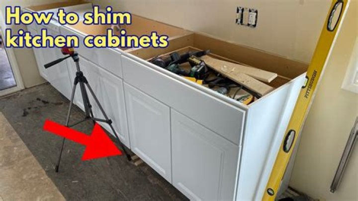 Do you leave shims under cabinets