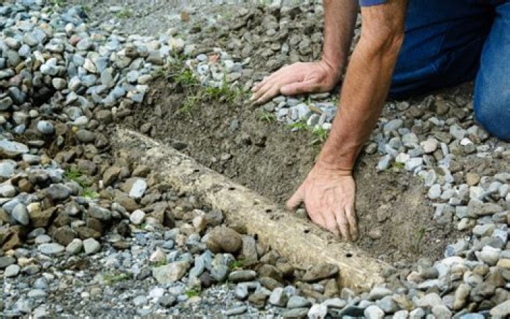 How deep do you bury weeping tile