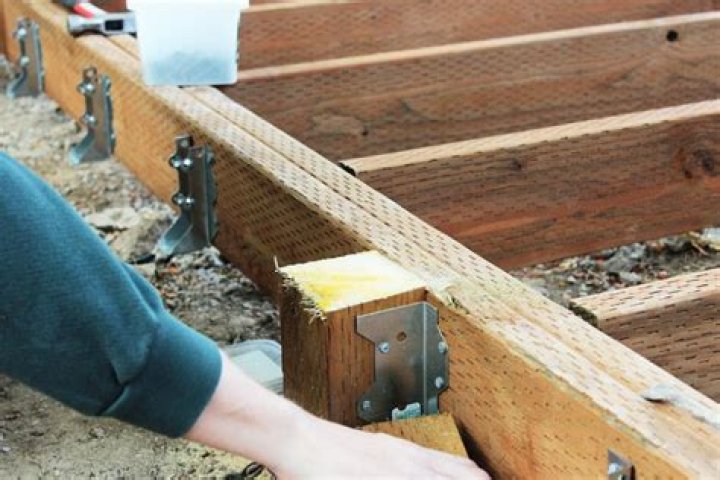 How do you attach decking to concrete