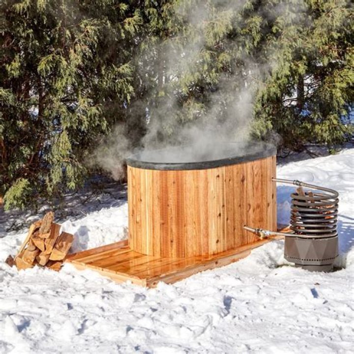 How do you build a heated wood hot tub