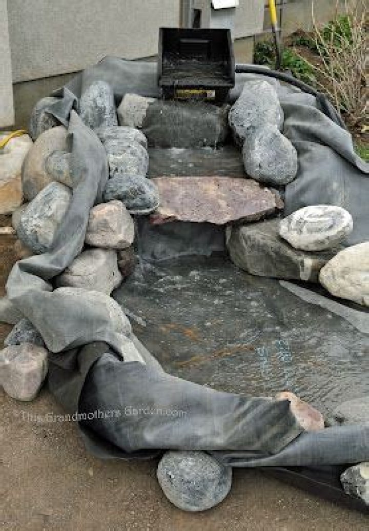 How do you hide a waterfall liner