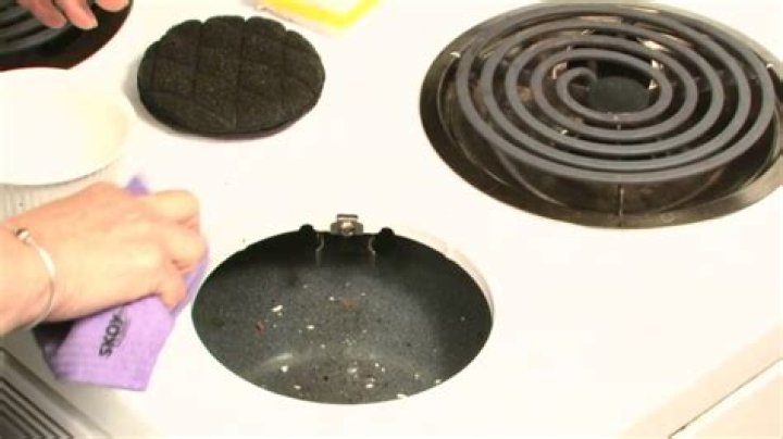 How do you remove stains from enamel stove top