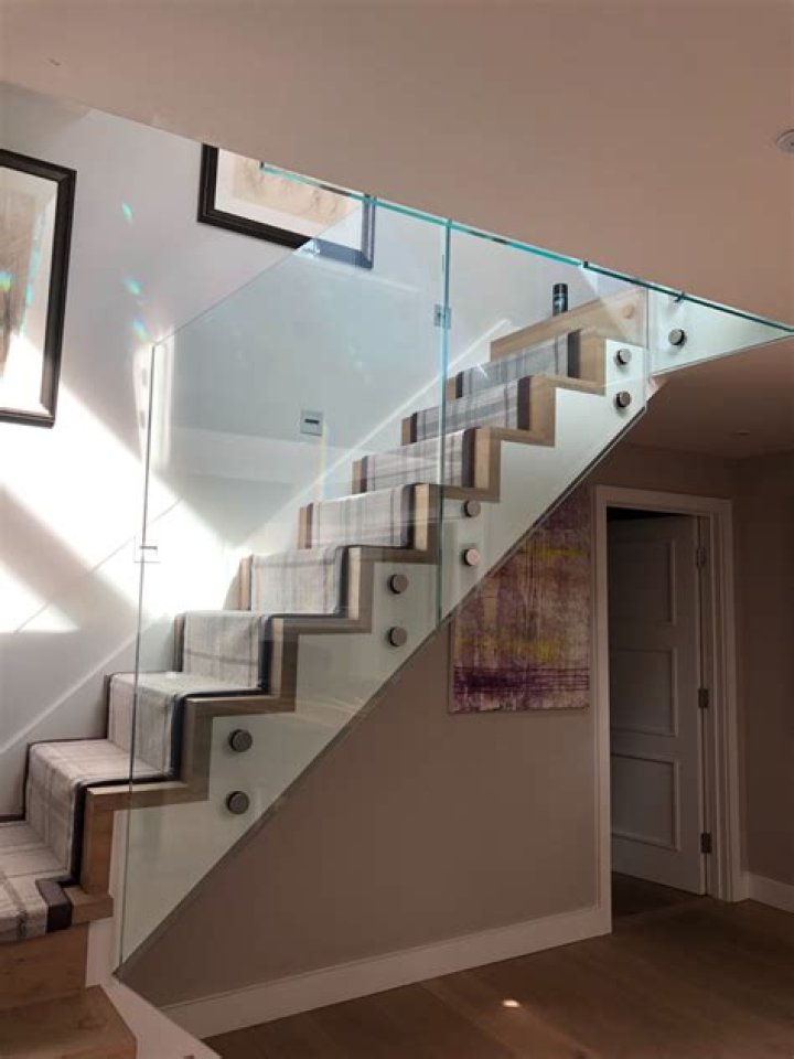 What are glass stairs made of