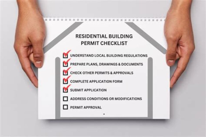 Who do you contact for a building permit