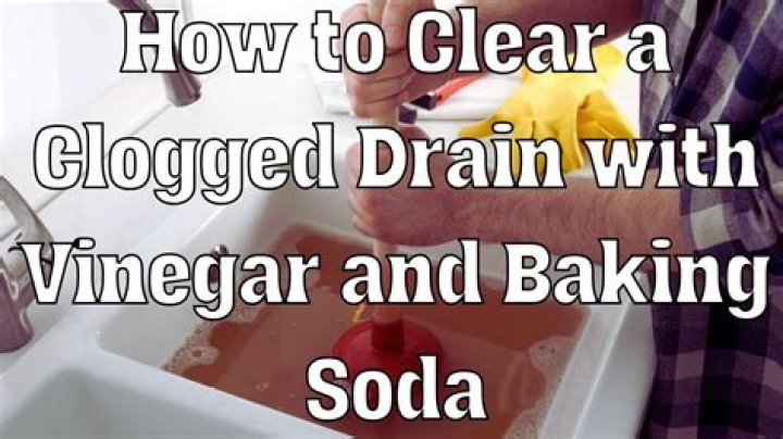 Will vinegar dissolve drain clogs